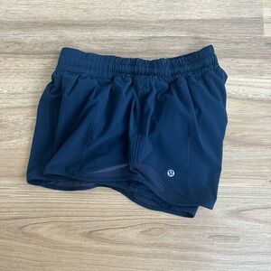 Lululemon Hotty Hot Lined Short 4”
Color: Navy 
Size: 6